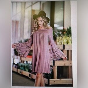 Lapis dress size S. Off the shoulders dress.